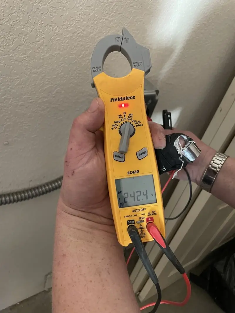 Voltage testing with clamp meter during Generator Installation in Micco